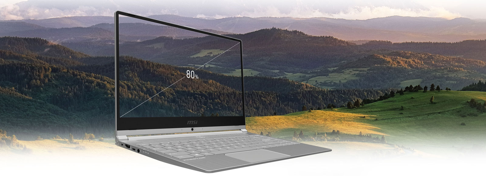 Modern 14 with a landscape scene in the monitor.