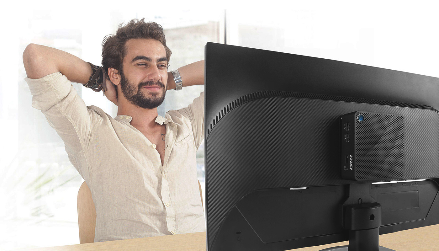 Cubi N mounted to the back of a monitor.